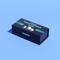 Vente en gros de boîte-cadeau de golf magnétique en papier noir de luxe boîte d'emballage de balle de golf de stratification brillante à couvercle rabattable avec insert en mousse