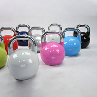 Kettlebell en acier coloré pour l'entraînement sportif, la perte de poids, le renforcement des fessiers et les squats en salle de sport