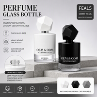 Flacon de parfum vide de luxe personnalisé en verre cylindrique de 30 ml, 50 ml, 100 ml avec bouchon géométrique polyédrique