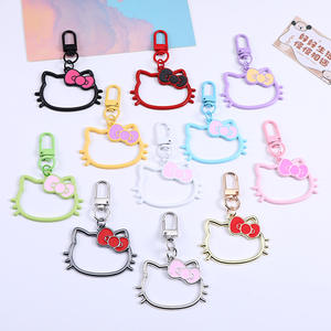 Colgante de aleación con forma de cabeza de gato de dibujos animados, hueco, con acabado de goteo de aceite y acabado colorido, para manualidades DIY, llavero para equipaje, funda para auriculares y decoración de bolsos - Product Image 1