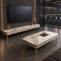 WYRAX Executive Lounge, aspect marbre, avec rangement dissimulé et console multimédia basse assortie sur pieds dorés