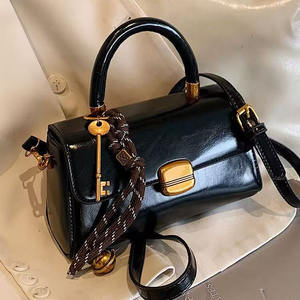 PU Leather Handbag with <b>Strap</b> <b>Buckle</b> and Metal Clasp Shoulder and Crossbody Design - Product Image 3