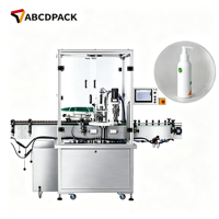 Machine de remplissage et de bouchage monobloc avec alimentation automatique des bouchons pour l'emballage de flacons de spray anti-moustiques