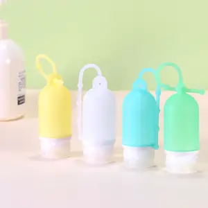 Bouteille en silicone personnalisée réutilisable tube de lotion cosmétique portable kit de toilette à presser étuis approuvés par le TSA kit de voyage pour shampoing