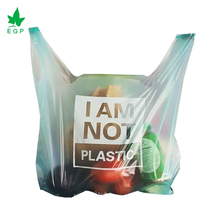 100% बायोडिग्रेडेबल बड़े कचरा खाद्य बैग हीट सील वाल्व हैंडल ग्रेव्योर मुद्रित ब्लिस्टर पैकेजिंग बायोडिग्रेडेबल टी-शर्ट बैग