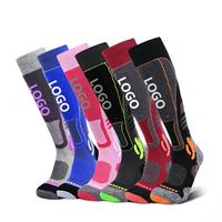 Chaussettes de ski en laine mérinos, épaisses, avec coussinets en tissu éponge, thermiques, longues, pour hommes et femmes, idéales pour la randonnée, le trekking et les sports d'hiver