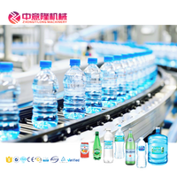 Ligne de production d'eau minérale pure à longue durée de vie entièrement automatique Machine de production de capsulage, remplissage et lavage de bouteilles en plastique