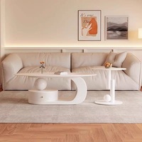 Ensemble de tables basses modernes haut de gamme, durables, avec rangement, compactes, légèrement luxueuses, de style français, en dalle de pierre ovale, couleur crème, pour salon