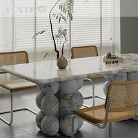 Table à manger contemporaine en marbre gris naturel Tostone, finition personnalisée, base en pierre pour projets résidentiels et d'intérieur