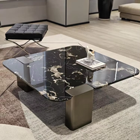 Table basse moderne en marbre naturel avec structure en acier inoxydable, design durable, style luxe léger pour villas, appartements et salons
