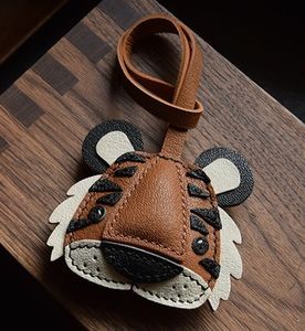 Zenos Customized Luxury Genuine <b>Leather</b> High Quality Irregular Shape Tiger Pendant <b>Keychain</b> for Car & Handbag Accessories - Product Image 5