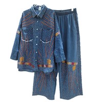 Novedad 2026: Conjuntos de mujer de talla grande de alta gama con camisa vaquera de manga larga con pedrería termoadhesiva y pantalón de pierna ancha con patchwork, al por mayor.
