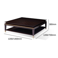 Table basse en acier miroir doré et pieds en cuivre Chic et contemporain