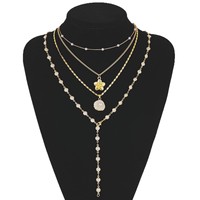 Collier pendentif fleur en perles multicouche plaqué or, ensemble de colliers superposés pour femme, longue chaîne de pull, bijoux inaltérables