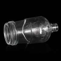 Embouteilleur rond en verre transparent personnalisé pour liqueur Design Flint pour Brandy Gin Rhum Vodka Tequila Whisky Bouchon supérieur d'étanchéité "Vente en gros