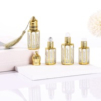 Vente en gros de flacons de parfum à l'huile d'attar arabe fantaisie dorée octogonale fine de 3 ml, 6 ml, 12 ml avec bille roulante et bâtonnet