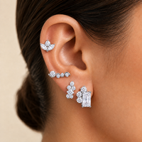 Vente en gros de bijoux de piercing pour femmes : Clous labret à dos plat en titane F136 plaqué or, stériles, avec zircon, motifs papillon, trèfle, lotus