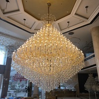 Lustre LED en cristal personnalisé OEM/ODM de style moderne pour décoration intérieure, salle de bal, hall, escalier