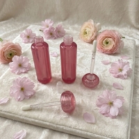Tube de brillant à lèvres transparent rose effet cristal, tube de gloss en forme d'apsule, contenant de sérum pour les lèvres