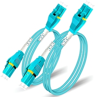 Câble de brassage fibre optique blindé Uniboot LC UPC vers LC UPC OM3 OM4 50/125µm Multimode LSZH Aqua Jumper pour centre de données