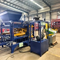 Machine de formage de blocs de béton hydraulique QT4-15B pour usine de briques en ciment