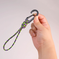 Lanière porte-clés portable tressée à la main à sept brins, anti-perte, avec crochet de fixation rapide multifonctionnel pour camping et randonnée