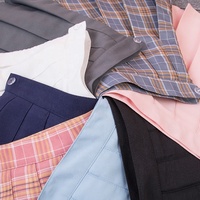 Jupe plissée taille haute personnalisée pour femme, avec boutons sur le bas, jupe de danse, couleurs bonbon, mini-jupe trapèze à carreaux pour femme