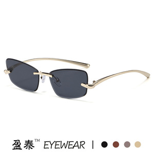 แว่นกันแดดทรงแคทอายไร้กรอบโลหะสีทอง UV400 แฟชั่นสำหรับผู้หญิง - Product Image 1