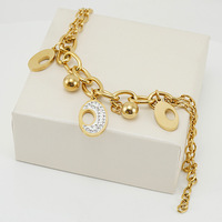 Bracelet trèfle à quatre feuilles en acier inoxydable or 18 carats à double couche inspiré de l'Europe et de l'Amérique Bracelet de mode pour femmes