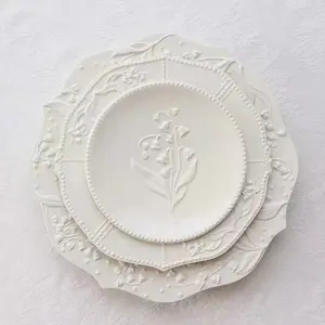 Piatto piatto in porcellana per piatti in ceramica nordica con salsa bianca coreana automatica per il commercio all'ingrosso