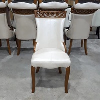 Chaise de salle à manger minimaliste faite à la main en bois massif avec siège en cuir pour la maison, le mobilier domestique et la vente en gros commerciale