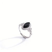 Bague vintage en argent 925 avec turquoise ovale cabochon et filigrane, détail latéral orné