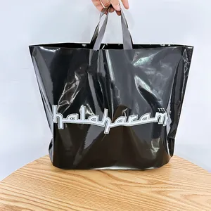 حقيبة بولي تصميم خاص حقيبة بلاستيكية للتسوق مع شعار مخصص لتعبئة وتغليف الملابس بيدين لينة وذات حلقة دوارة