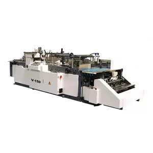 V-150 book jacketing and strapping machine with card insert function