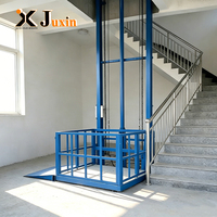Raylı Kargo Kaldırma Platformu Yük Asansörü Dört Kolonlu Mal Taşıma Platformu Depoda Mal Taşımak İçin