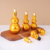 Flacons compte-gouttes en verre plaqué or pour huiles essentielles et sérums capillaires, en gros, capacités de 10 ml à 100 ml, avec emballage de vente au détail.
