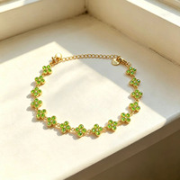 Bracelet tendance en acier inoxydable avec trèfle à quatre feuilles incrusté de zircons colorés, luxe léger et haut de gamme