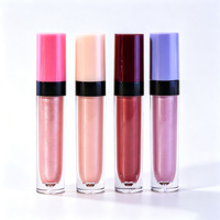 Gloss à lèvres liquide brillant, format voyage, tube cylindrique haut, anneau noir, capuchon coloré, applicateur doe foot