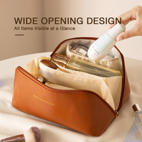 Étui à outils de maquillage en cuir PU laiteux style coquille avec intérieur spacieux et poche détaillée pour le rangement quotidien des cosmétiques