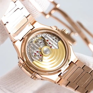 Reloj Mecánico de Lujo para Mujer con Esfera Dorada Rosa Estilo Joyería, Incrustada con Gemas de Colores y Patrón Ondulado - Product Image 5