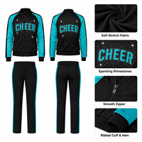 Conjunto de entrenamiento de porristas en negro y verde azulado: Chaqueta de porristas con pedrería personalizada y pantalones rectos para calentamiento y práctica.