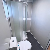 Maison conteneur en acier démontable à plat avec design moderne pour bureau préfabriqué, entrepôt ou chambre à coucher