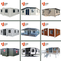 Maison conteneur préfabriquée moderne extensible à deux étages, installation facile, panneaux sandwich en acier, résistante aux ouragans