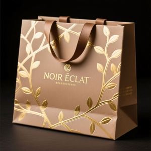 Sacs en papier kraft personnalisés haut de gamme estampés à chaud avec poignées pour le shopping de luxe - Product Image 1