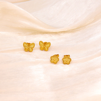 Joyería de temperamento para mujer, pendientes de mariposa versátiles, joyería de acero inoxidable, pendientes de trébol de cinco hojas de la suerte para mujer