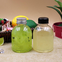 Bouteille en PET de qualité alimentaire pour soda, jetable, transparente, en plastique, pour emballage de liquides et jus, vente en gros