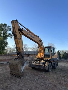 Excavatrice sur pneus de haute qualité HYUNDAI 210W-9 d'occasion avec faible kilométrage et système hydraulique - Product Image 2