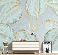 Papier peint mural en art linéaire doré avec des feuilles tropicales bleues pour salon de beauté, salon et boutique