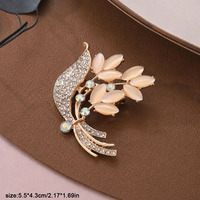 Broche élégante en alliage œil de chat incrustée de strass, look frais et délicat, épinglette polyvalente pour col de femme, corsage créatif et tendance pour le quotidien