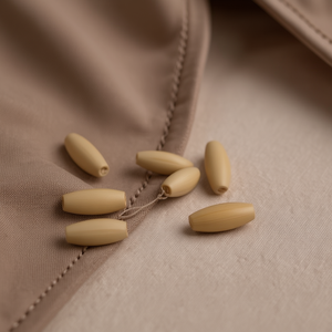 Perle ovale en bois Ilan 30x12 mm pour accessoires vestimentaires - Product Image 3